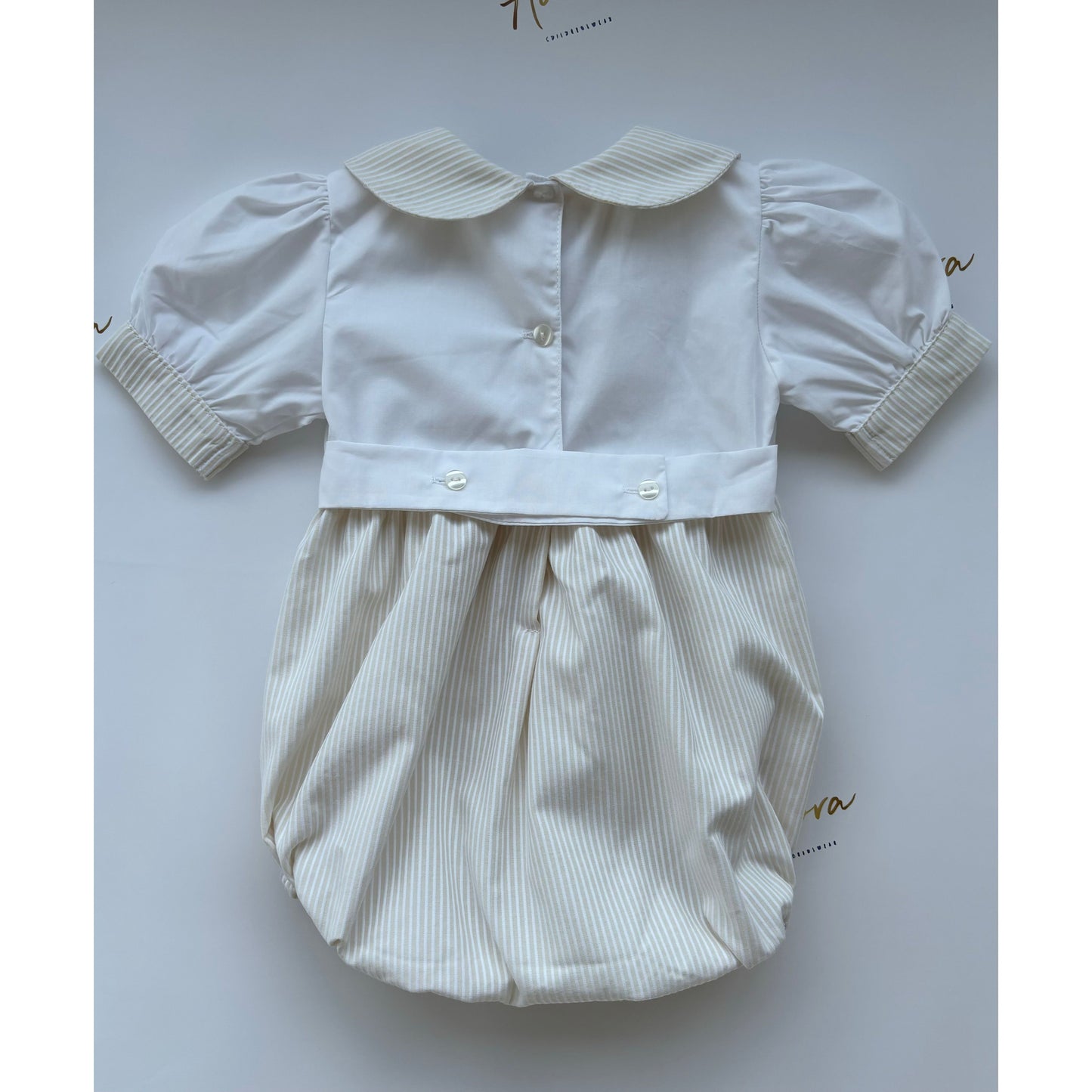 Boys cream romper by Portuguese brand Meraki - Adora Childrenswear 