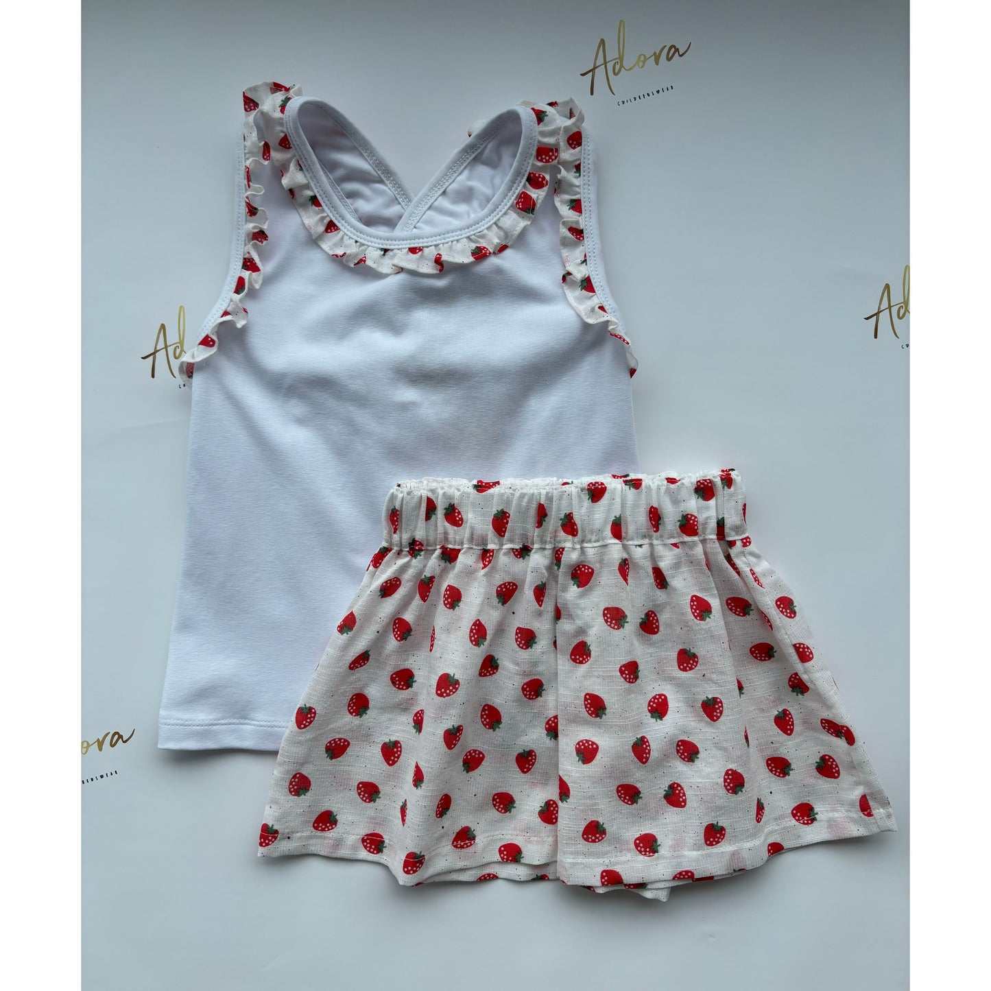 Girls pool coverup - shorts and vest with strawberry print - Adora Childrenswear 