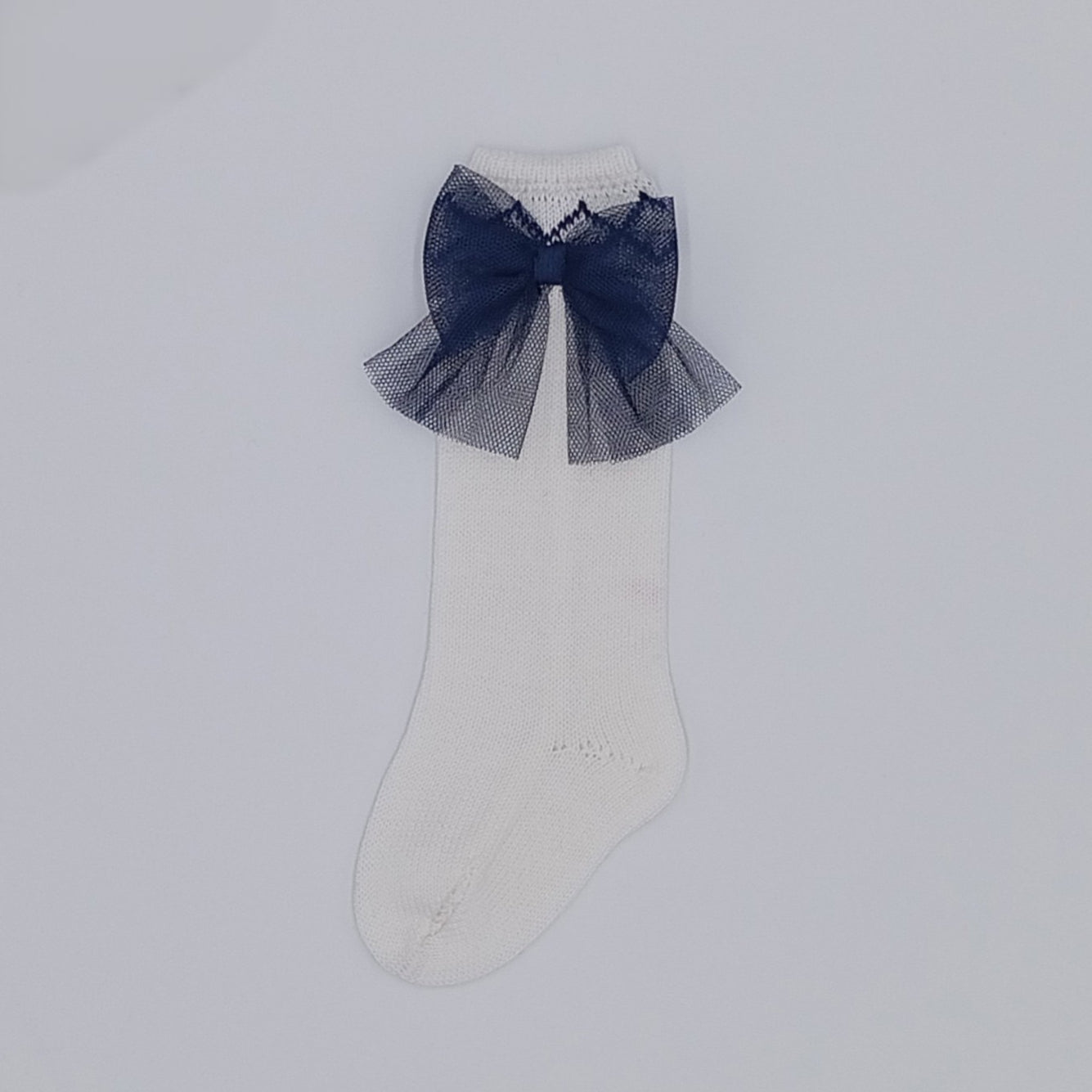 Rahigo SS26 girls white knee socks with navy check detail and navy tulle bows 