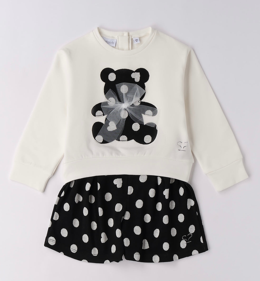 Girls black spotty shorts and ivory sweater with black sporty teddy bear detail