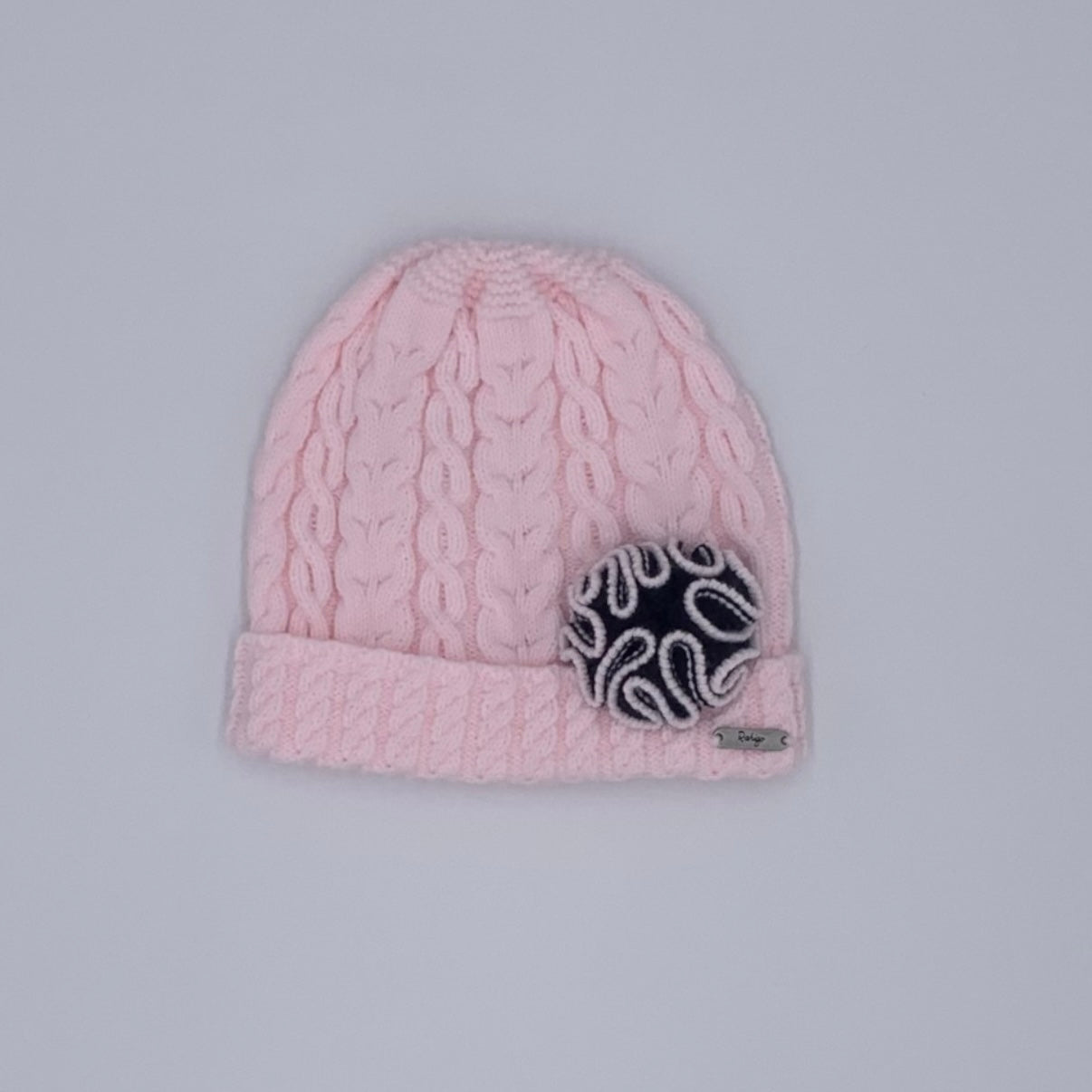 Baby girls pink winter Rahigo hat with navy rosette detail - Adora Childrenswear