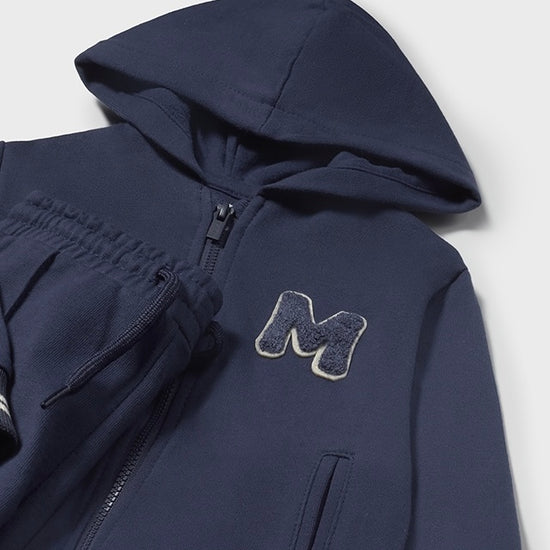 Mayoral boys navy tracksuit with white striped detail on the cuffs and ankles 