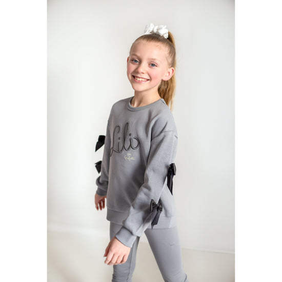 Load image into Gallery viewer, Lili Gaufrette grey cotton sweater with black bow detailing  
