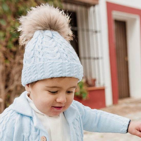 Baby blue knitted hat with large fur pom by Rahigo for Winter - Adora Childrenswear 