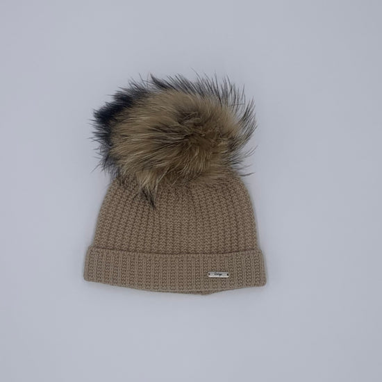 Kids knitted hat for winter with large fur pom from Spanish brand Rahigo