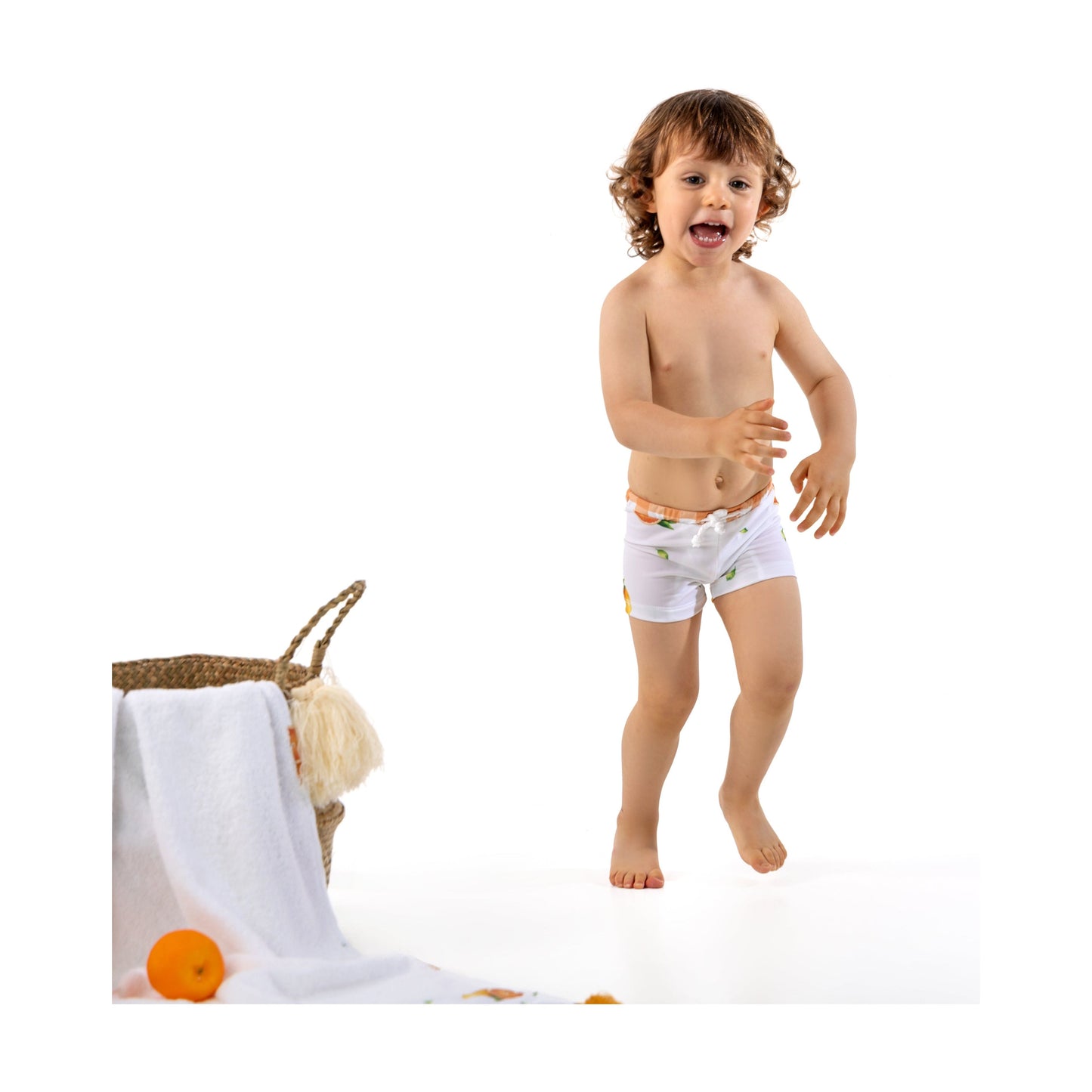 Load image into Gallery viewer, Meia Pata Lycra shorts in oranges print - Adora Childrenswear
