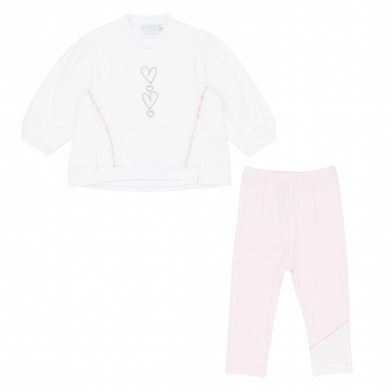 White long-sleeve shirt with heart design and pink leggings on a white background
