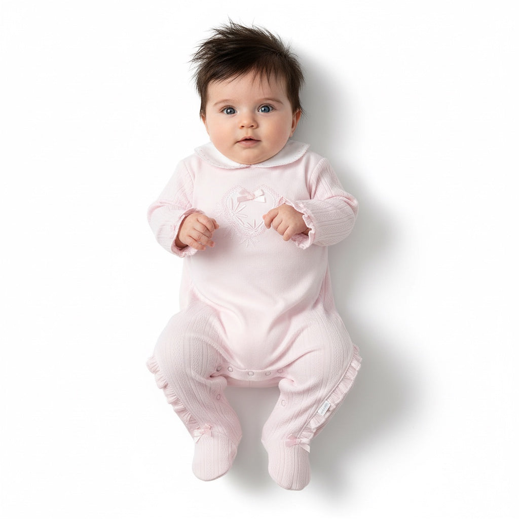 Baby girls pink and white babygrow by Pastels & Co