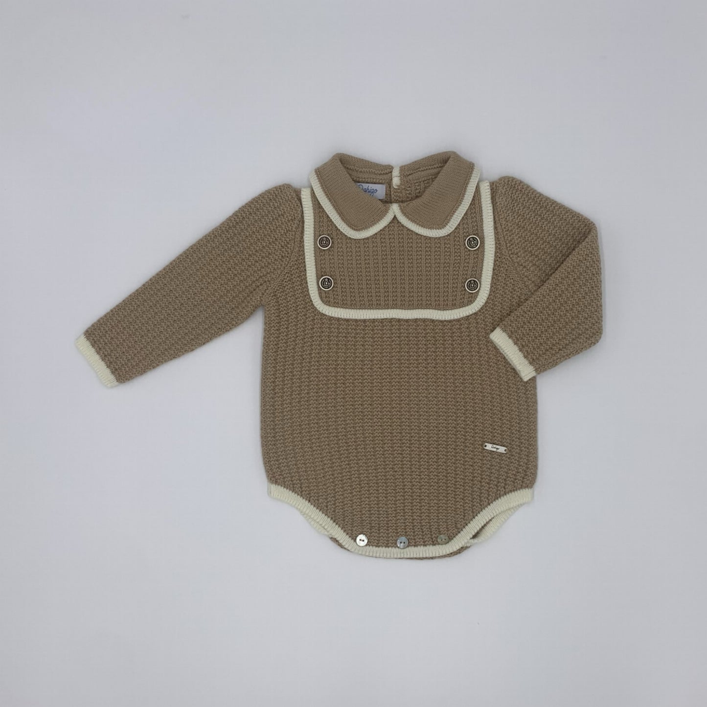 Boys knitted camel and cream romper by Spanish brand Rahigo new for Winter 2024 